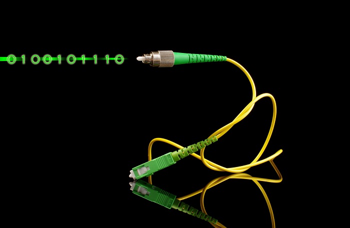 Fiber optics path cord and light digital signal concept - Fiber Internet Costs